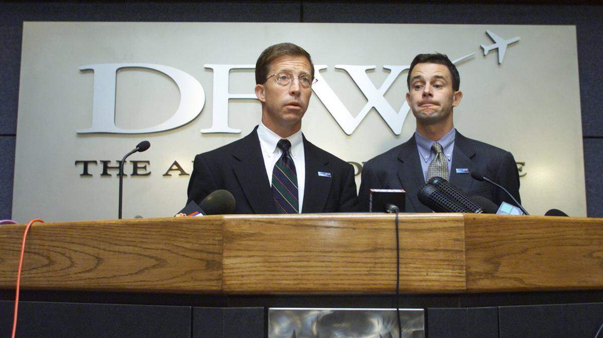 Jim Crites, left, executive vice president for security and operations at DFW International Airport, takes questions at a press conference on the afternoon of Sept. 11, 2001. He is with Kevin Cox, senior executive vice president at DFW.