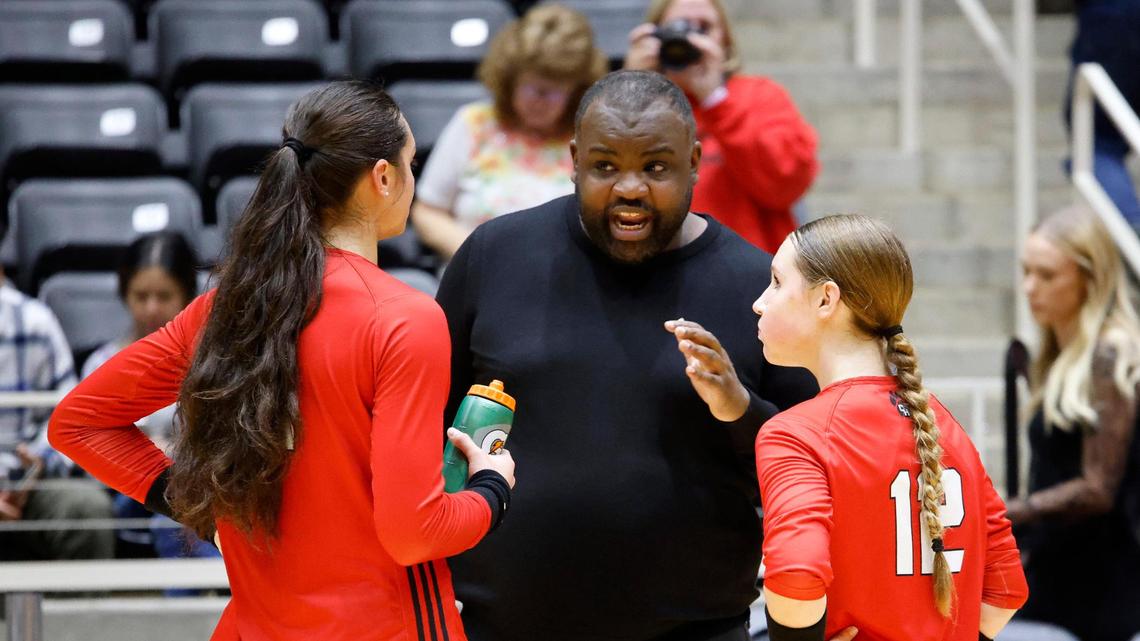 Colleyville Heritage head coach Josh McKinney talks with Colleyville Heritage’s Suli Davis (11) and Claire Bundy (12) during a side change in game 3 of the best 3 of 5 games at Culwell Center in Garland, Texas, Friday, Nov. 17, 2023. The Colleyville Heritage Panthers went down 3-1.