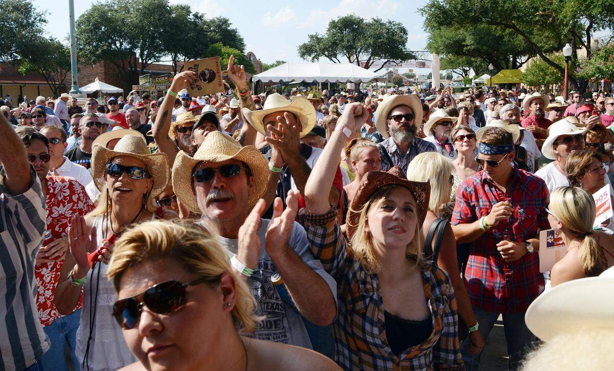 July 4, 2012: The crowd cheers for Billy Joe Shaver as he performs at the Willie Nelson’s Fourth of July Picnic at the Billy Bob’s Texas in the Stockyards