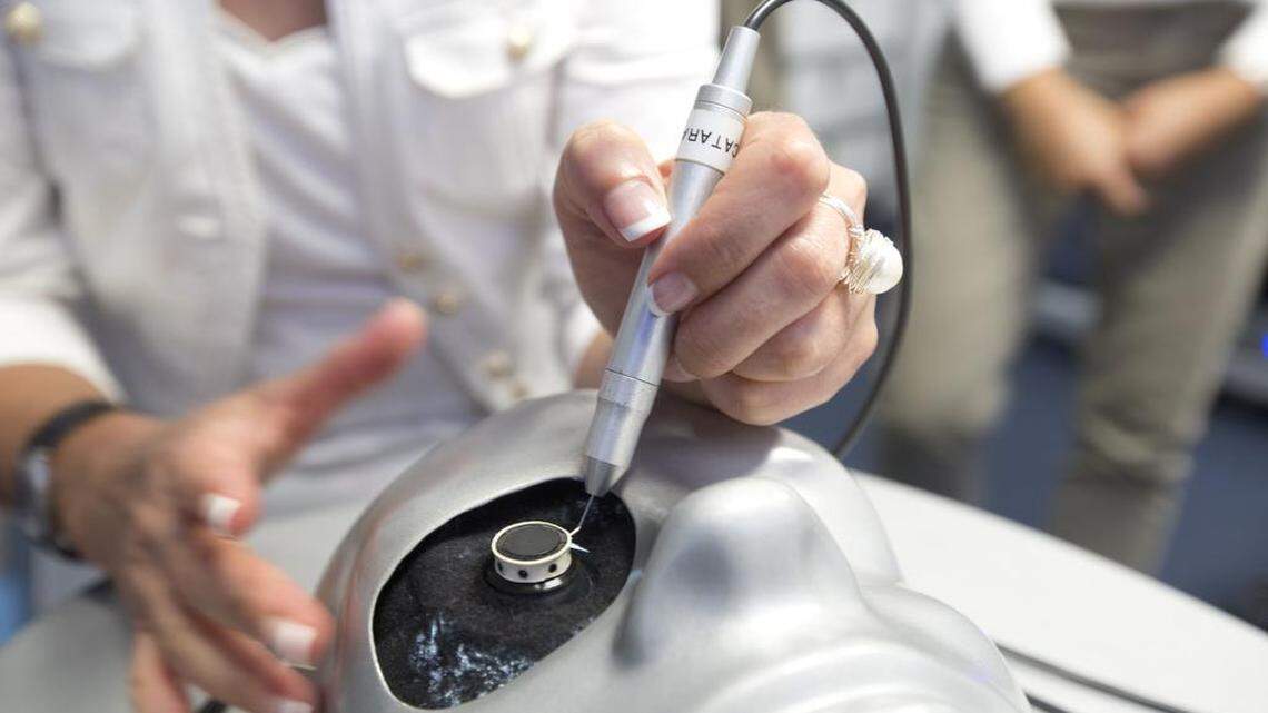 Alcon's Bettina Maunz tries out the state-of-the-art  laser treatment room aboard the Flying Eye Hospital in 2016.