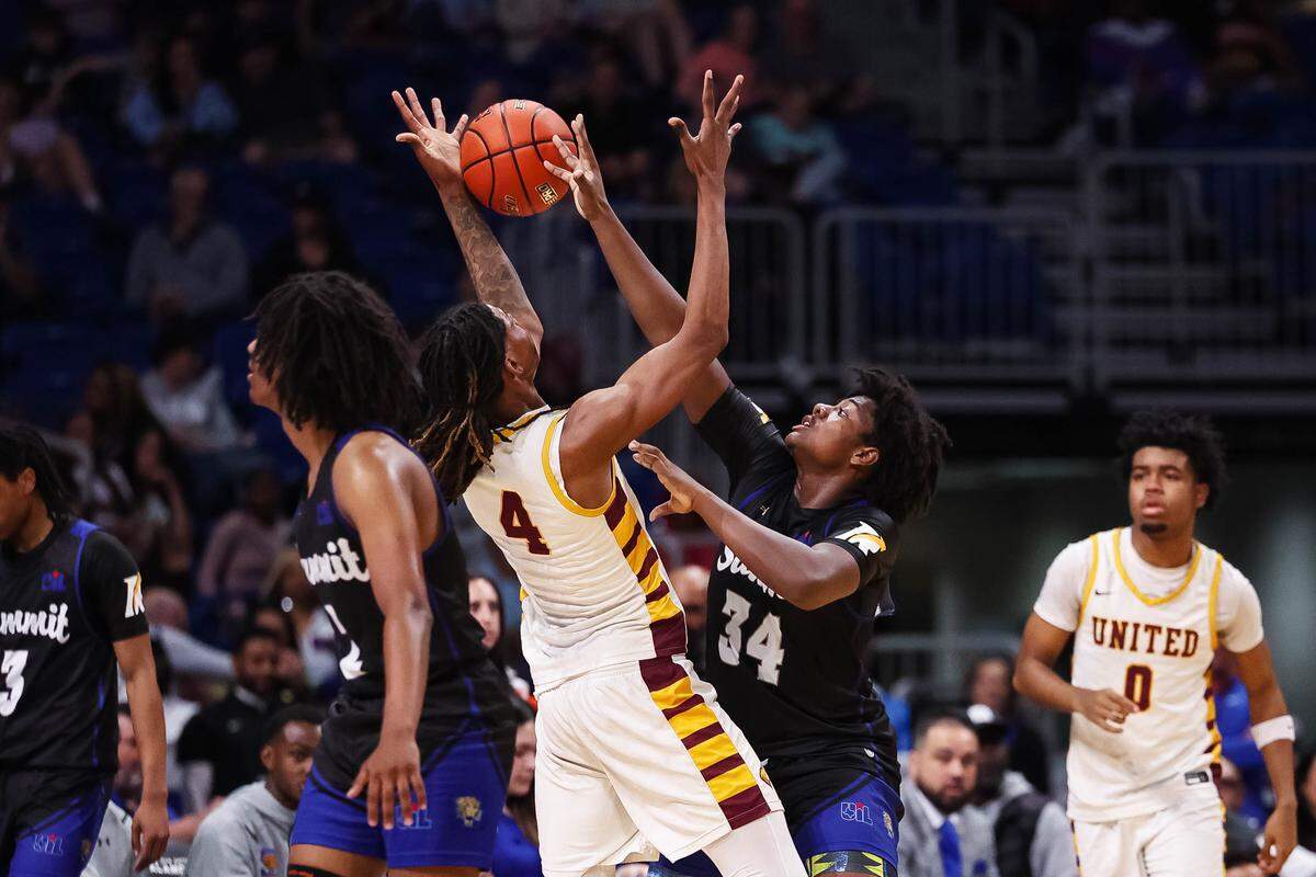 Mansfield Summit forward Emund Prichett II (34) deflects a ball out of the hands of a Beaumont United player in the Class 5A Division II state championship at The Alamodome in San Antonio, Texas, March 14, 2026.