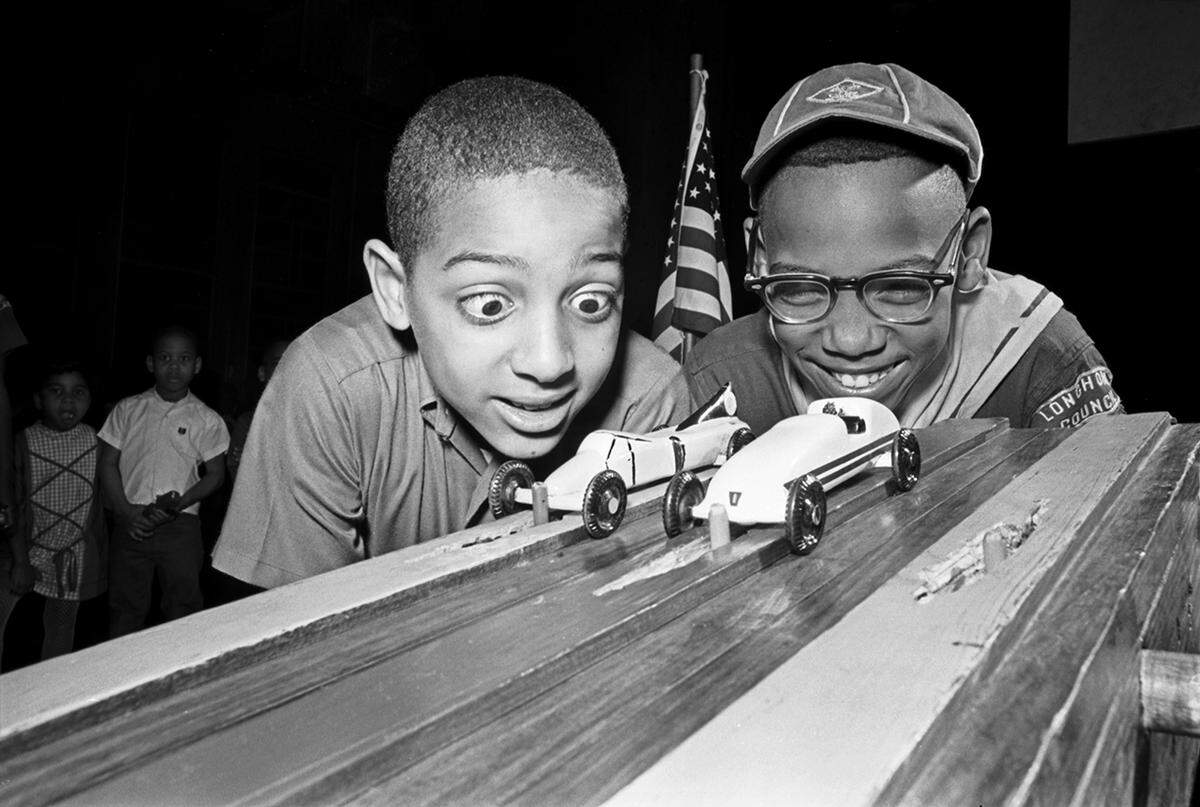 March 2, 1968: Reginald Young, left, and Glen Williams, 10, give their Pinewood Derby racers a final check before their final race Friday night at the 1968 Cub Scout Olympics held by the Woodbine Trail District Longhorn Council of the Boy Scouts. Williams’ racer zoomed down the track for the winning trophy. The event was held in Harmon Recreation Center in Fort Worth and was attended by about 100 cub and boy scouts.