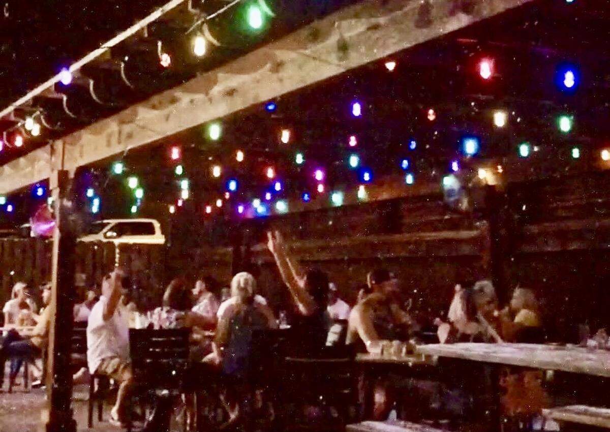 The covered and lighted patio at the Lakehouse on Eagle Mountain Lake in Fort Worth, Texas