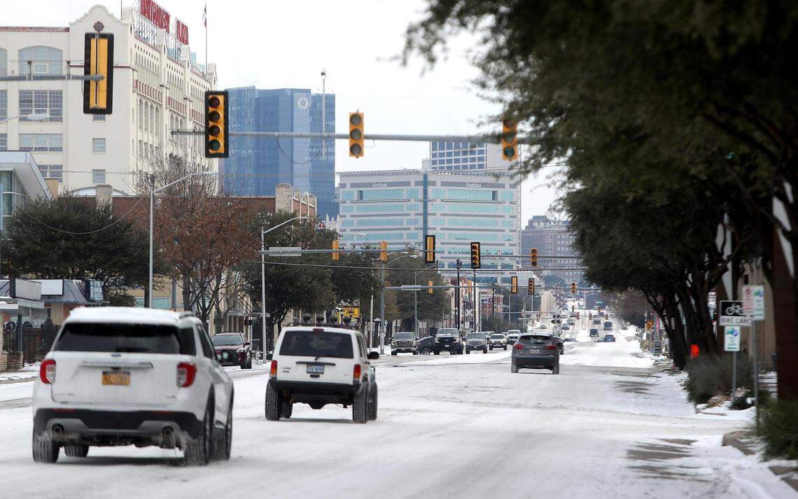 Traffic lights are out on a stretch of West 7th Street in Fort Worth on Feb. 16, 2021.