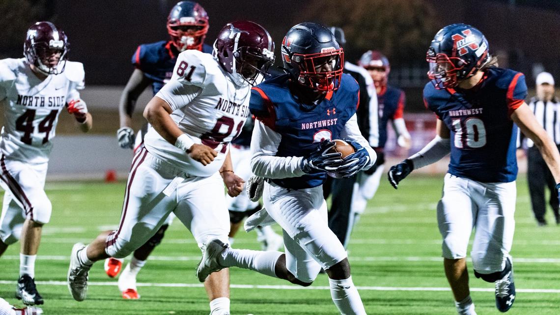 Northwest’s Zavion Taylor (2) zigzags around North Side defenders for a touchdown during the first half of a high school football game at Northwest ISD Stadium in Justin, Texas, Thursday, Nov. 7, 2019.