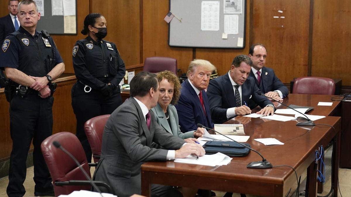Apr 4, 2023; New York, New York, USA; Former President Donald Trump appears in court for arraignment before Judge Juan Merchan following his surrender to New York authorities at the New York County Criminal Court. Trump appeared in court to answer charges from a grand jury investigation into payments made during the 2016 campaign to bury allegations of extramarital sexual encounters. Mandatory Credit: Seth Wenig-Pool Photo via USA TODAY