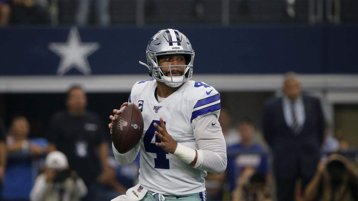 Dallas Cowboys’ Dak Prescott (4) throws a pass during warmups before a NFL football game against the New York Giants in Arlington, Texas, Sunday, Sept. 8, 2019. (AP Photo/Michael Ainsworth)