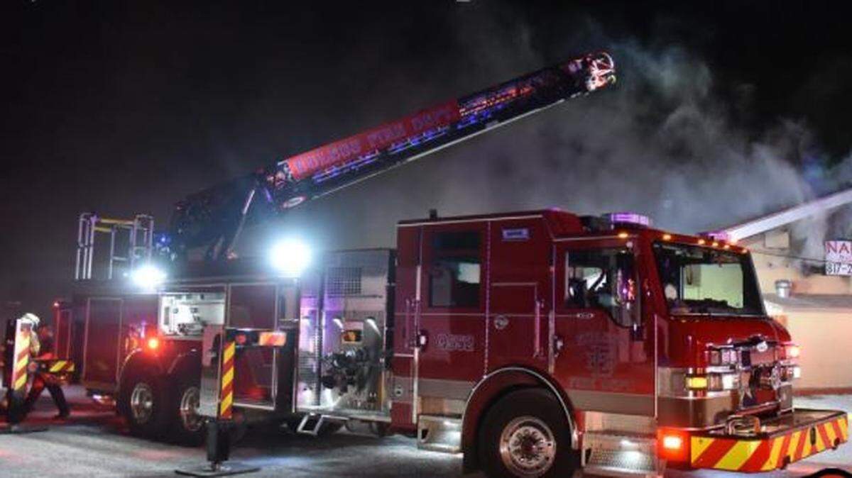 Firefighters from four departments battled a two alarm blaze early Saturday before finding one person dead inside Napoli's Italian Cafe