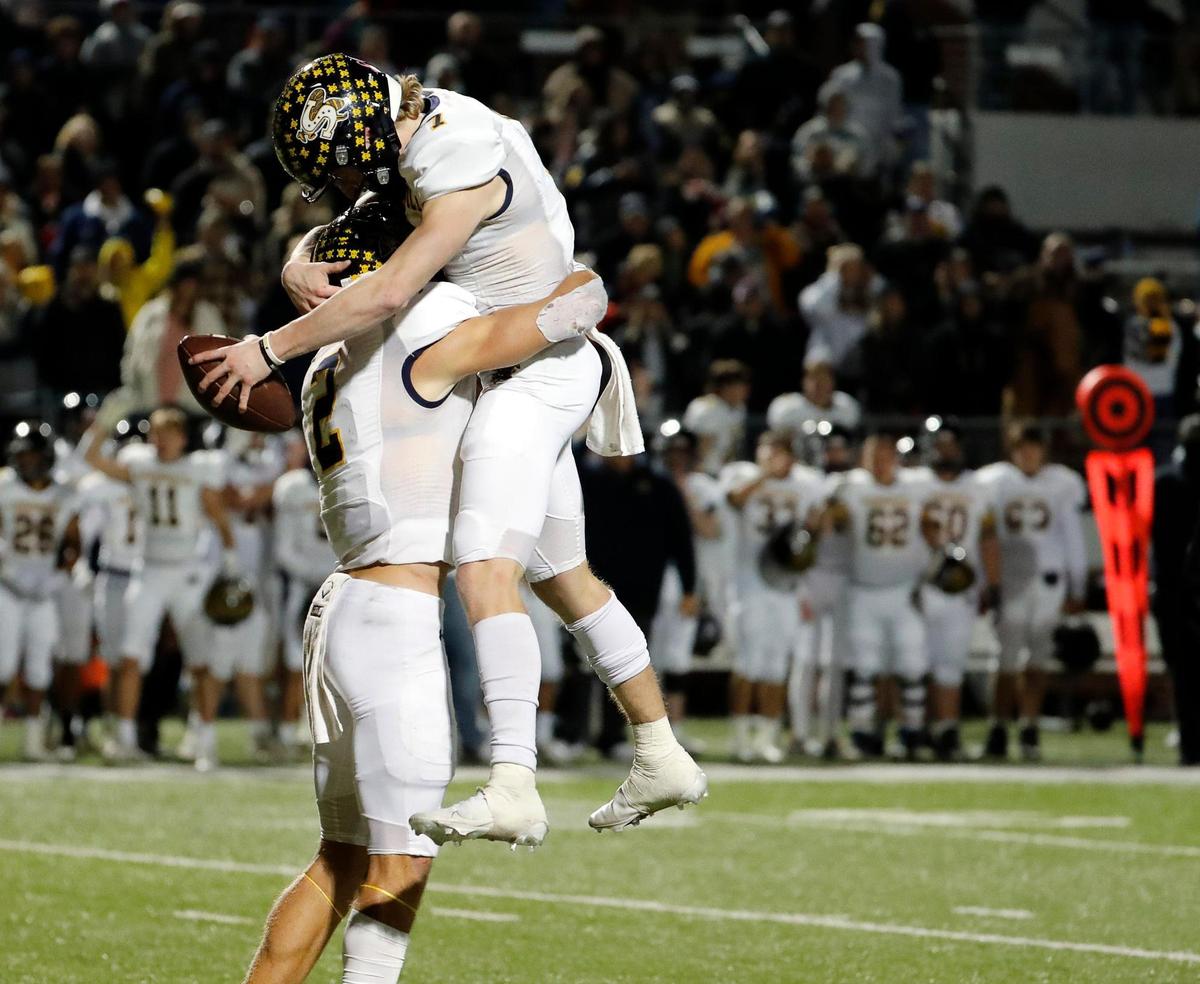 Stephenville wide receiver Coy Eakin (2) hoists quarterback Ryder Lambert (7) into the air after winning a high school Class 4A Division 1 Regional football game at Newsom Stadium in Mansfield, Texas, Friday Nov. 26, 2021. Lambert scored the winning touchdown. Stephenville defeated Argyle 21-17 to move on in the playoffs. (Special to the Star-Telegram Bob Booth)