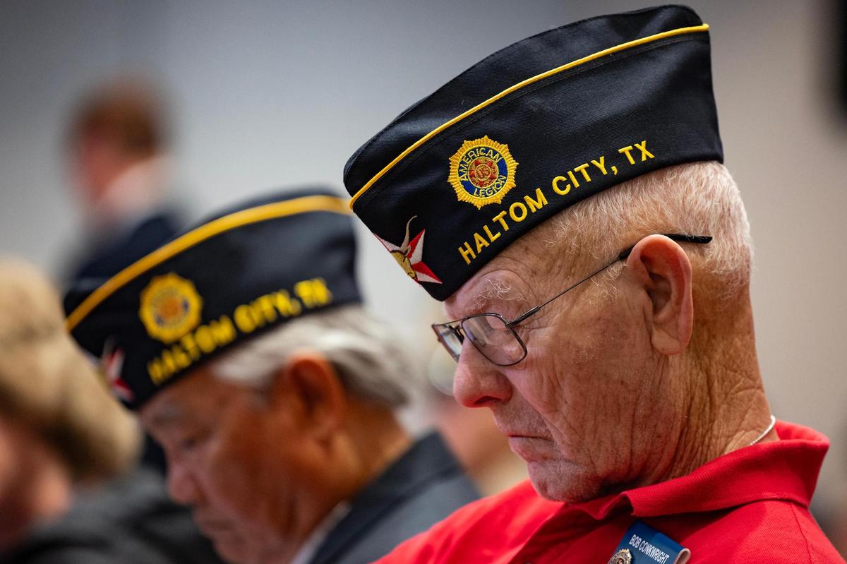 Vietnam War veteran Bob Conkwright bows his head in prayer with other veterans in attendance of the 50th Anniversary of the Vietnam War event at Haltom City City Hall in Fort Worth on Wednesday, April 30, 2025.