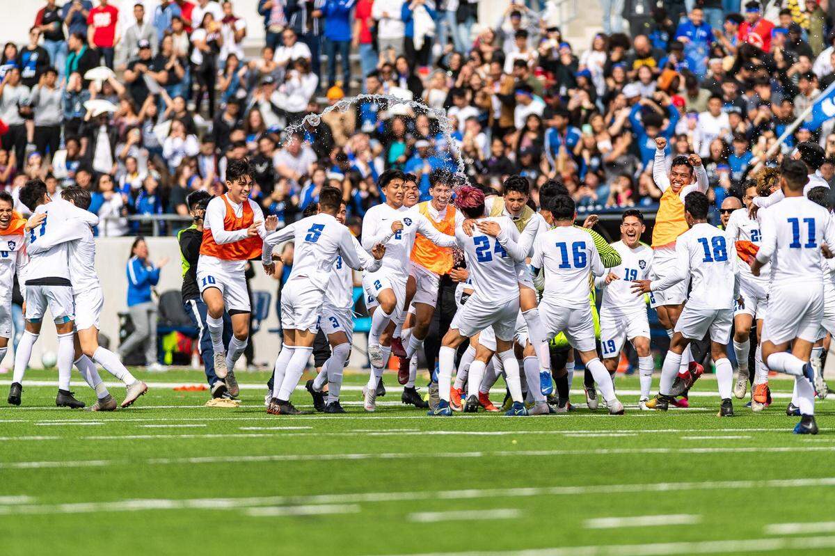 Grand Prairie celebrates its 1-0 win over Sam Houston during the 6A Region I semifinals, Friday April 12, 2019 at McKinney ISD Stadium.