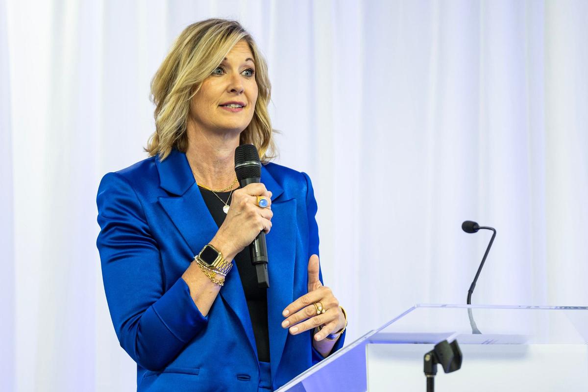 Traci Berry, the CEO of New Heights High School, speaks to the attendees gathered for the grand opening ceremony of the New Heights Adult High School at the Tarrant County College Opportunity Campus in Fort Worth on Wednesday, Sept. 25, 2024. New Heights is the first dual enrollment adult high school in Texas.