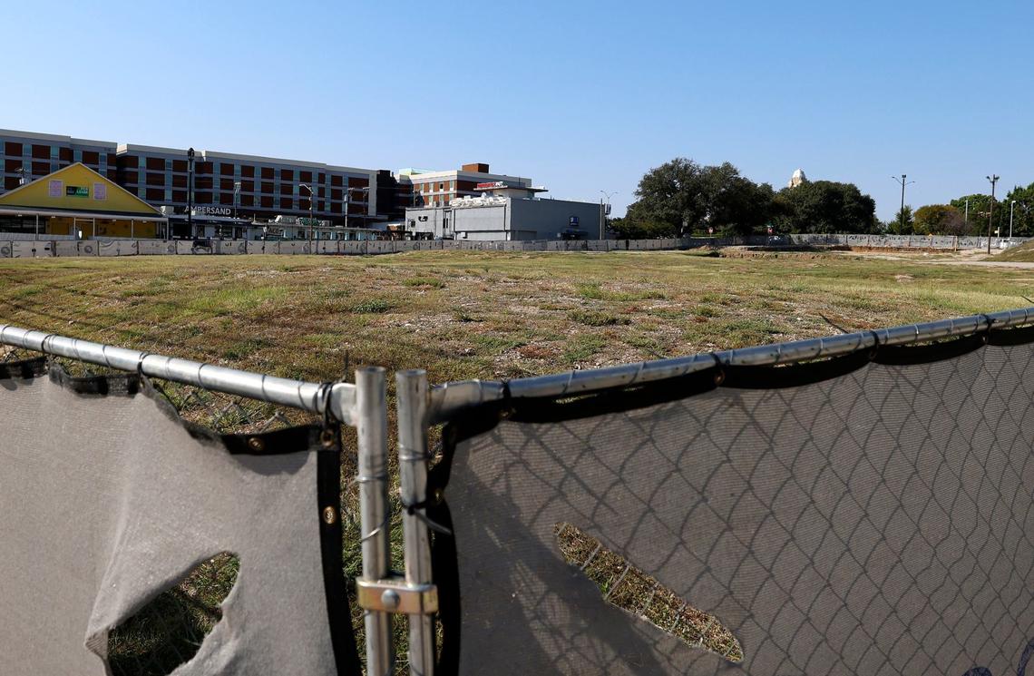 An empty lot at the corner of Morton and Norwood streets, the future home of the One University development.
