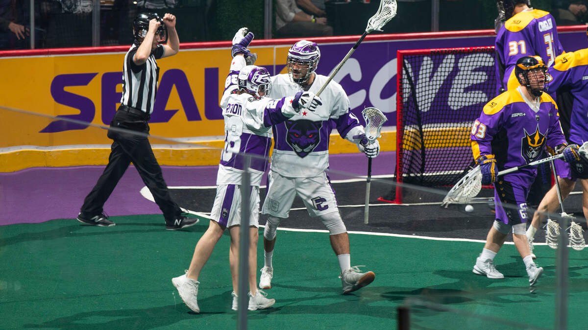 Panther City Lacrosse Club’s Phil Caputo, right, and Nathan Grenon, left, celebrate a goal during their 15-12 loss to the Seals in San Diego Saturday night. (Photo courtesy Panther City Lacrosse Club)