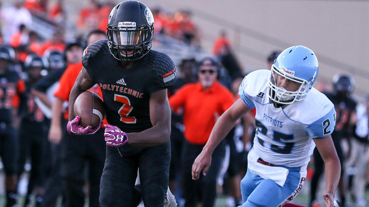 Polytechnic wide receiver Anthony Phenix (2) makes a reception and goes in for a touchdown against Thomas Jefferson during the first half, Thursday night, September 12, 2019 played at Scarborough-Handley Field in Ft Worth, TX.