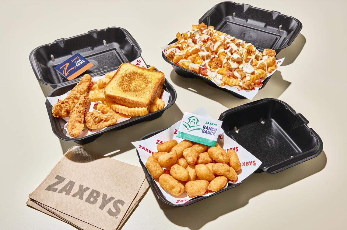 Pictured here is Zaxbys’ chicken tender combo, loaded chicken bacon ranch fries and fried white cheddar cheese bites.