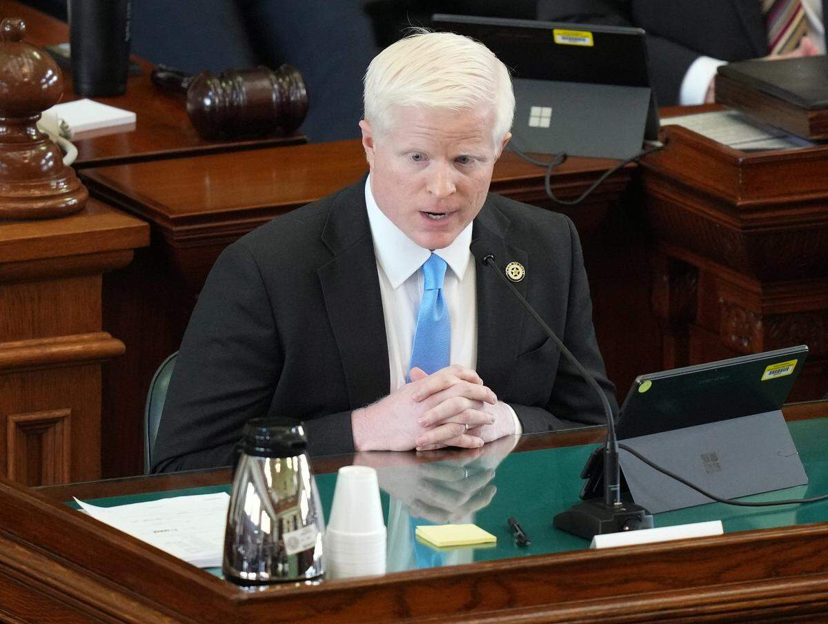 Austin Klinghorn, an associate deputy attorney general, testifies at the impeachment trial of Ken Paxton on Thursday.