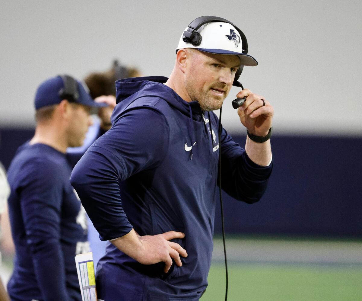 Liberty Christian head coach Jason Witten talks to staff upstairs in the first half of a TAPPS Region 2 semi-final football playoff game at The Ford Center in Frisco, Texas, Saturday, Oct. 25, 2023.