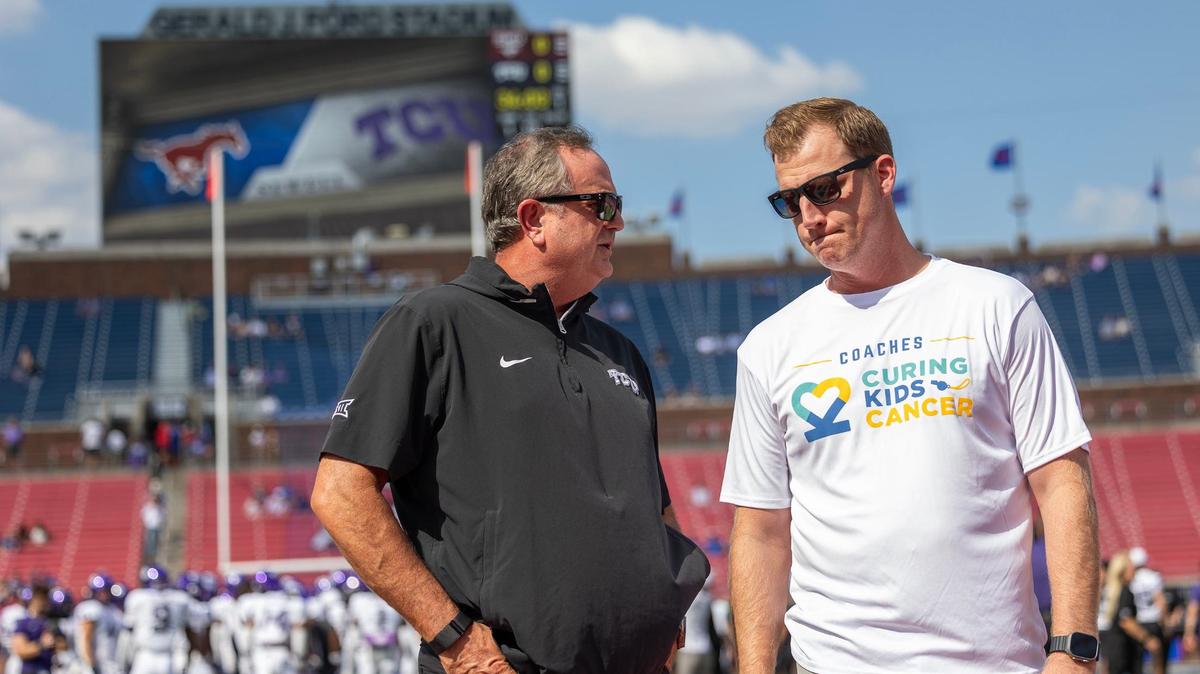 TCU Head Coach Sonny Dykes, left, and SMU Head Coach Rhett Lashlee speak to each other prior to Saturday’s game at SMU.