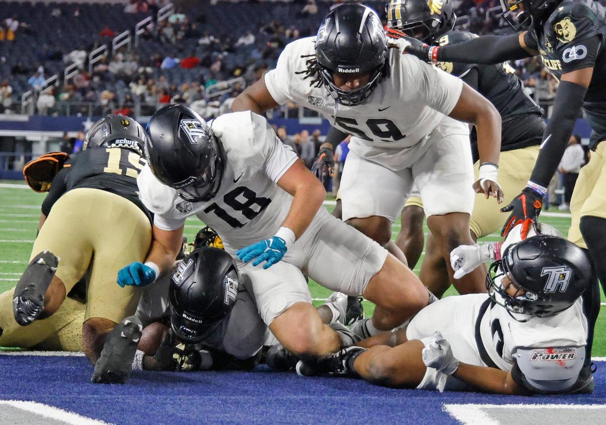 Richmond Randle athlete Dacorian Rubin (2) sneaks in underneath for six during the UIL 5A D2 State Championship football game at AT&T Stadium in Arlington, Texas, Friday, Dec. 20, 2024.