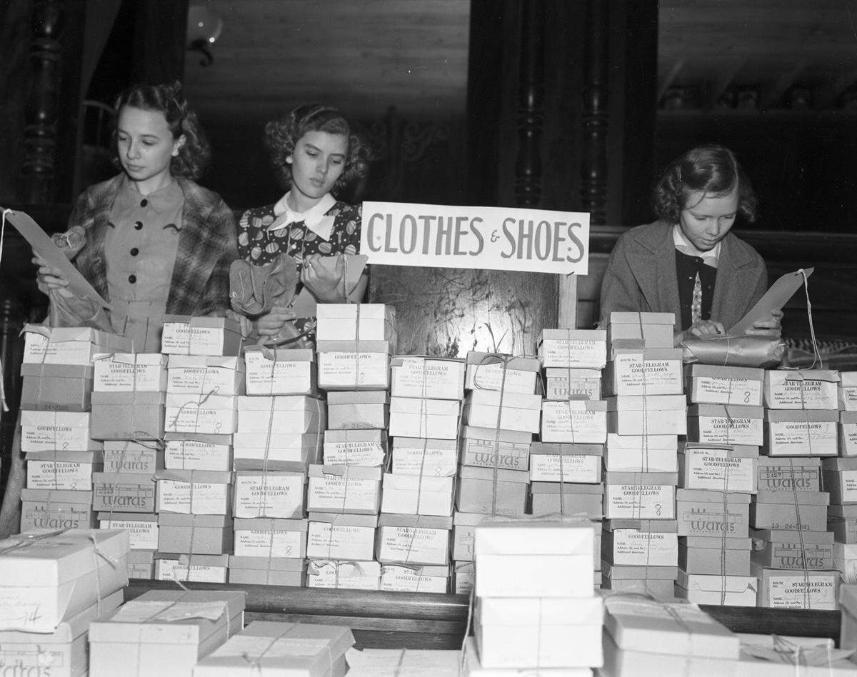 Dec. 21, 1937: Girl Scouts from McLean Junior High School work on Goodfellows’ Christmas bags at the Pioneer Palace; from left, Betty Winton, Nina Elliott, and Betty Sue Wathen.