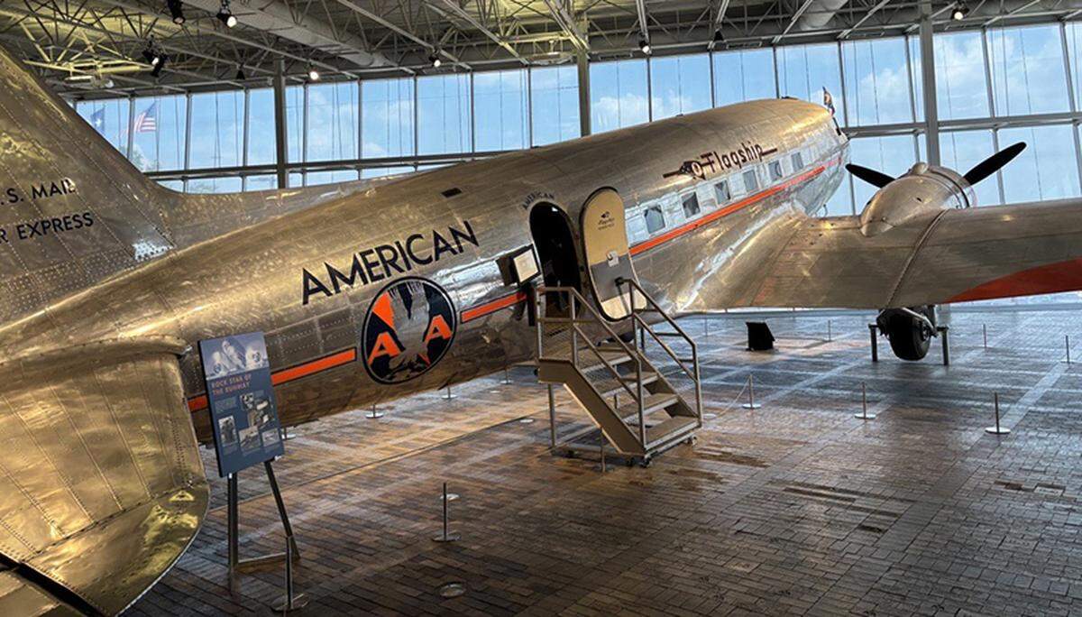 The new DFW Flagship plane is a Boeing 777-300 updated to honor the DC-3 plane which was the first aircraft to transport American customers in 1936.