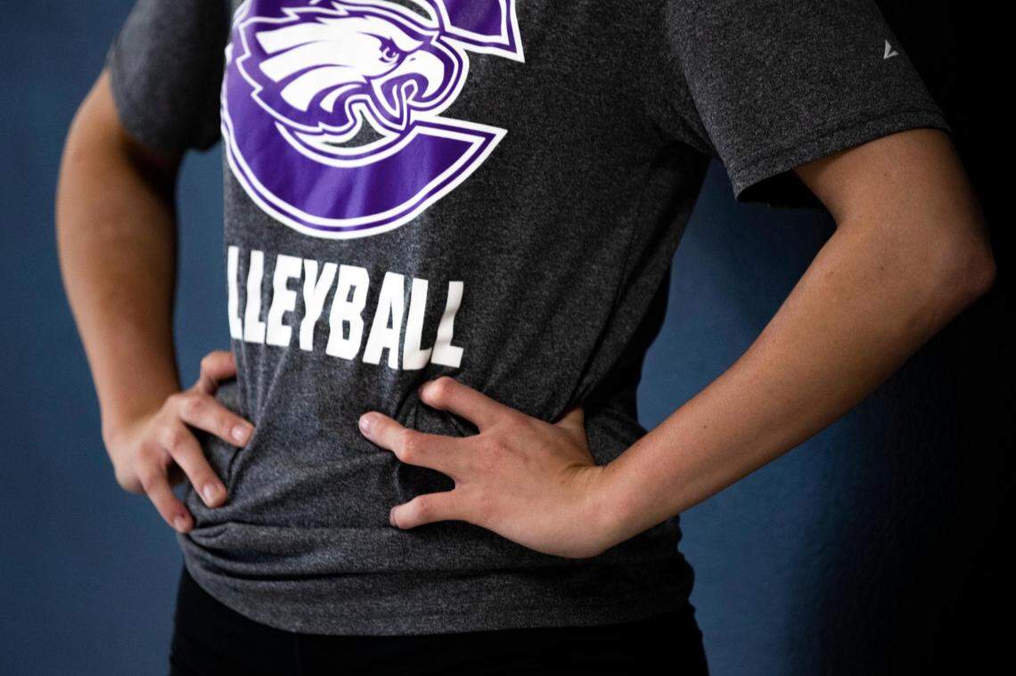 Crowley setter Jaden Polovina shows nine fingers. But she stars on the volleyball team and is committed to McPherson College.