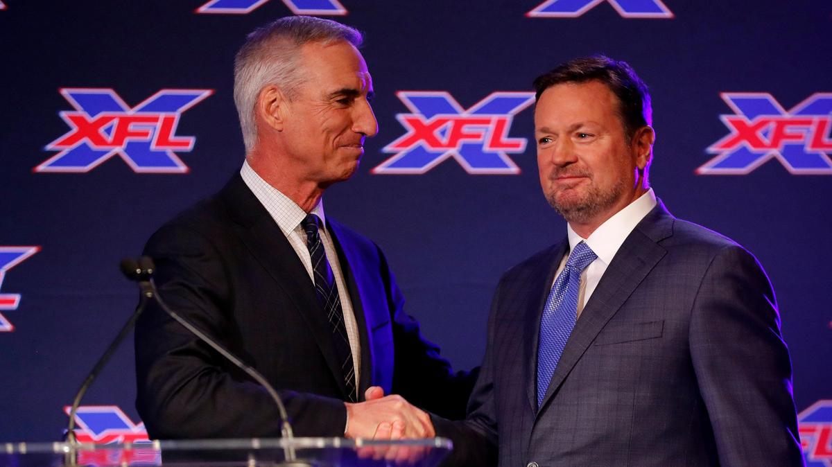 XFL Commissioner and CEO Oliver Luck welcomes new Dallas XFL head coach and general manager Bob Stoops to the stage at Globe Live Park in Arlington, Texas, Thursday, Feb. 07, 2019. The seven other cities to host teams will be Houston, New York, L. A. Washington, Seattle, St. Louis and Tampa Bay. (Star-Telegram Bob Booth)