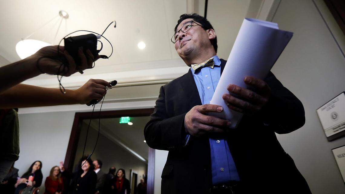 Judge Alex Kim takes questions from the media before entering a closed meeting of the Tarrant County Board of District Judges on Thursday, February 20, 2020, at the Tarrant County Family Law Center in Fort Worth. The board was gathered to vote on whether or not to remove all or some CPS cases from the 323rd District Court, where Judge Alex Kim presides.