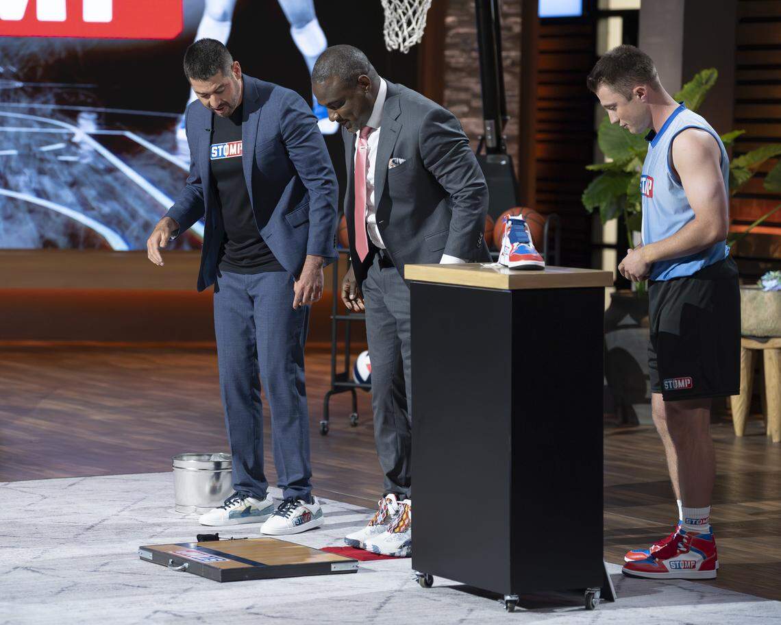 Guest shark Rashaun Williams tests out STOMP Athletic’s mini mat traction pad on season 17, episode 17 of “Shark Tank.”