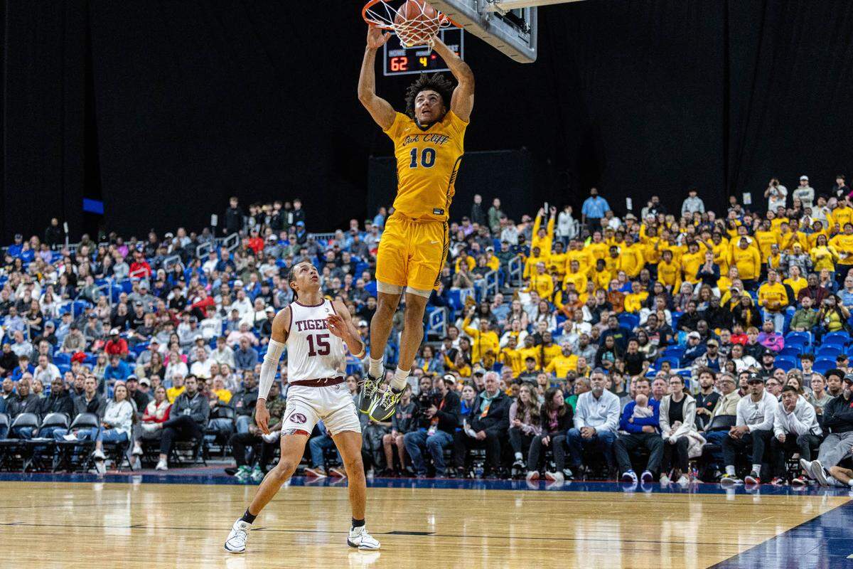 Oak Cliff Faith Family senior guard Isaac Williams makes a dunk in the Class 4A state championship game on Saturday, March 9, 2024 at the Alamodome in San Antonio, Texas. Faith Family defeated Silsbee 80-66.