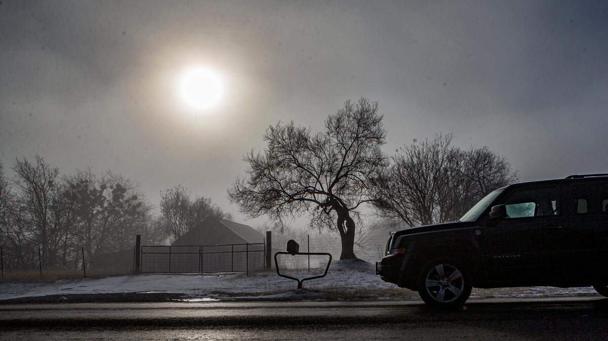 Fog rolled through Granbury, Texas, Saturday, Feb. 5, 2022, with Hood County still under a hard freeze. Sleet and snow blanketed most of North Texas making driving conditions hazardous and road maintenance crews busy clearing roads and highways.