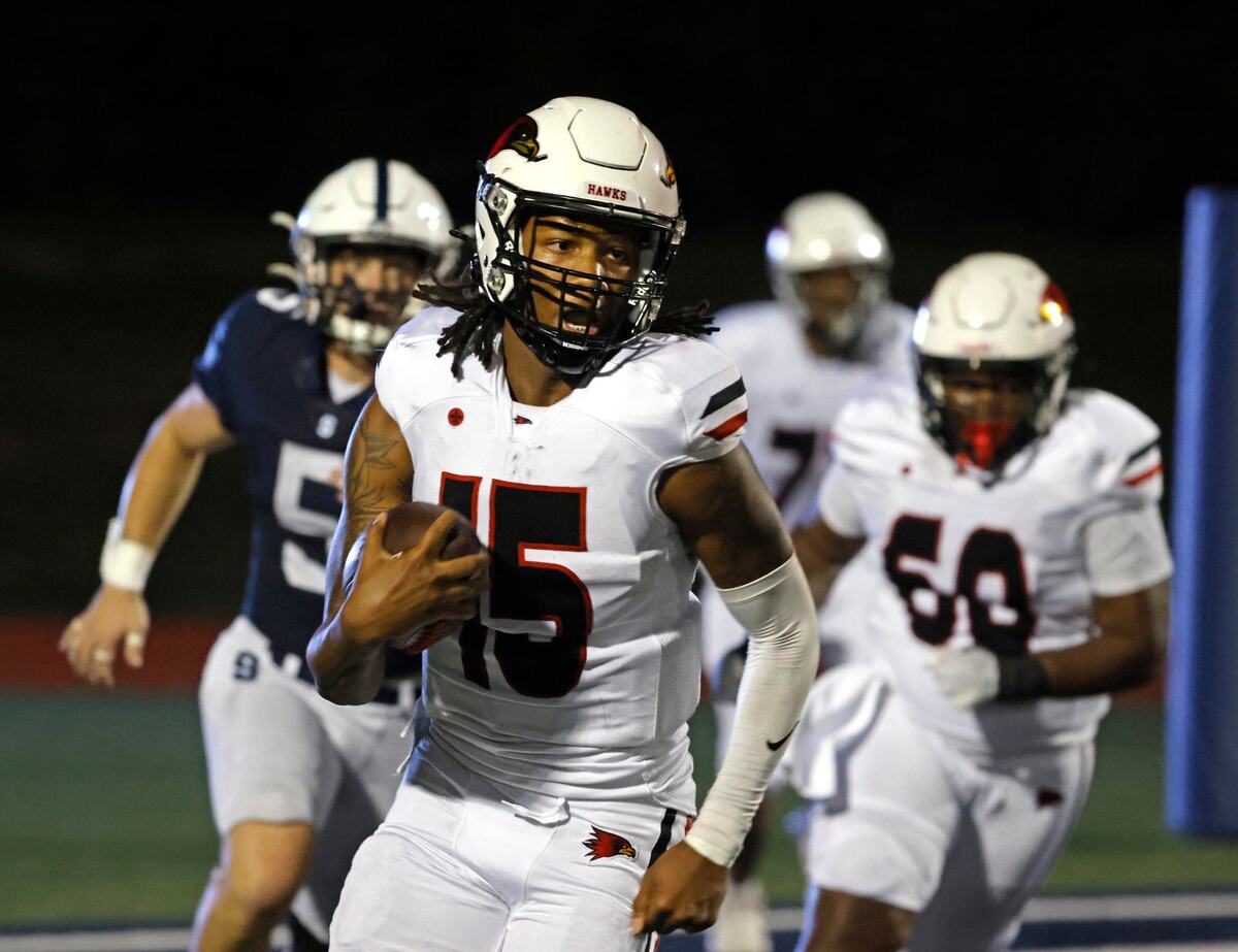 Quarterback Kishon Hill (15) and the rest of the Lift For Life Academy offense were running for their lives during a TAPPS football game at All Saints High School’s McNair Stadium in Fort Worth Thursday, Sept. 12, 2024.