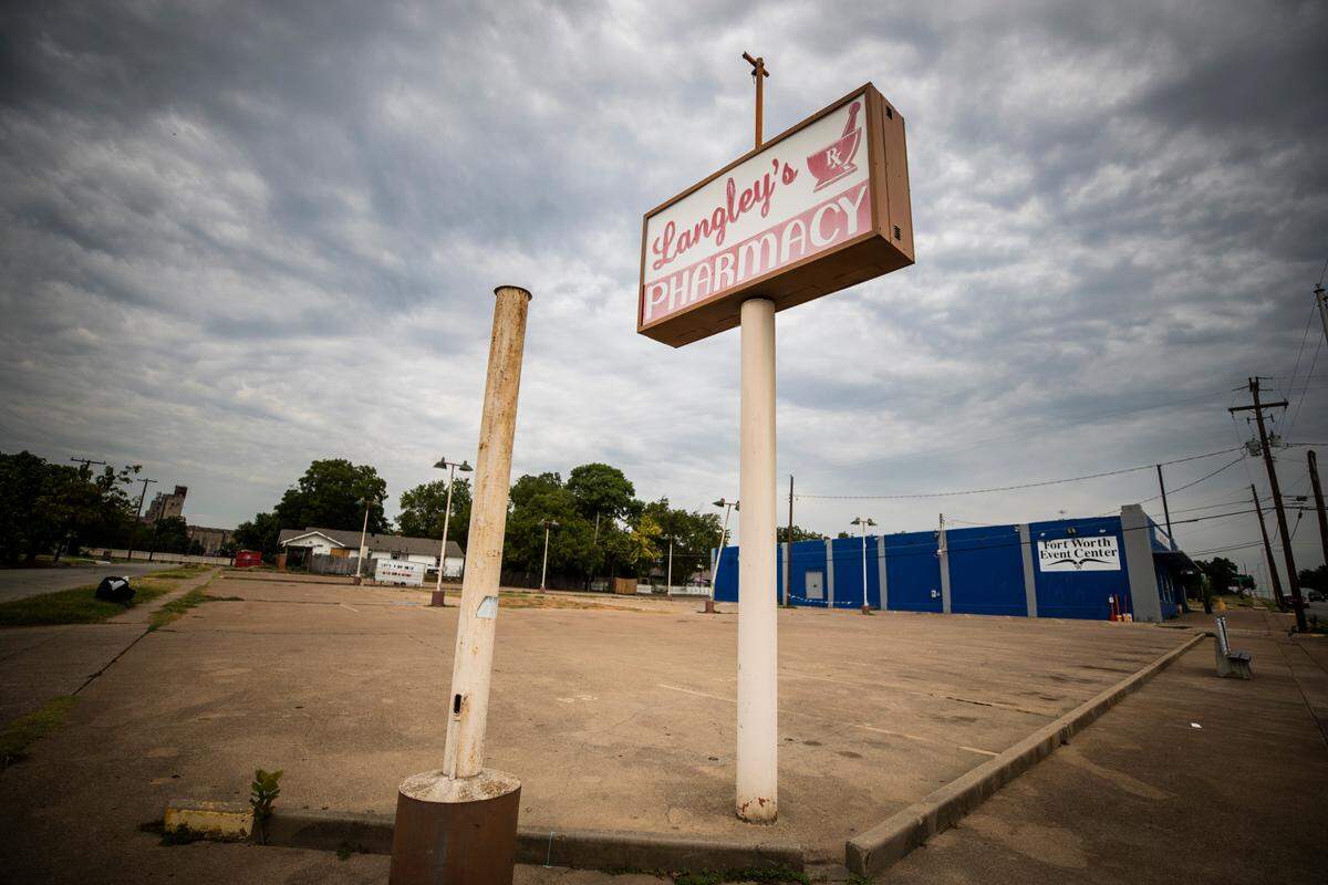 A sign for Langley’s Pharmacy is all that remains of the business on Evans Avenue in the Hillside neighborhood in Fort Worth. Hillside, Morningside and the Historic Southside neighborhoods don’t have any health clinics or pharmacies.