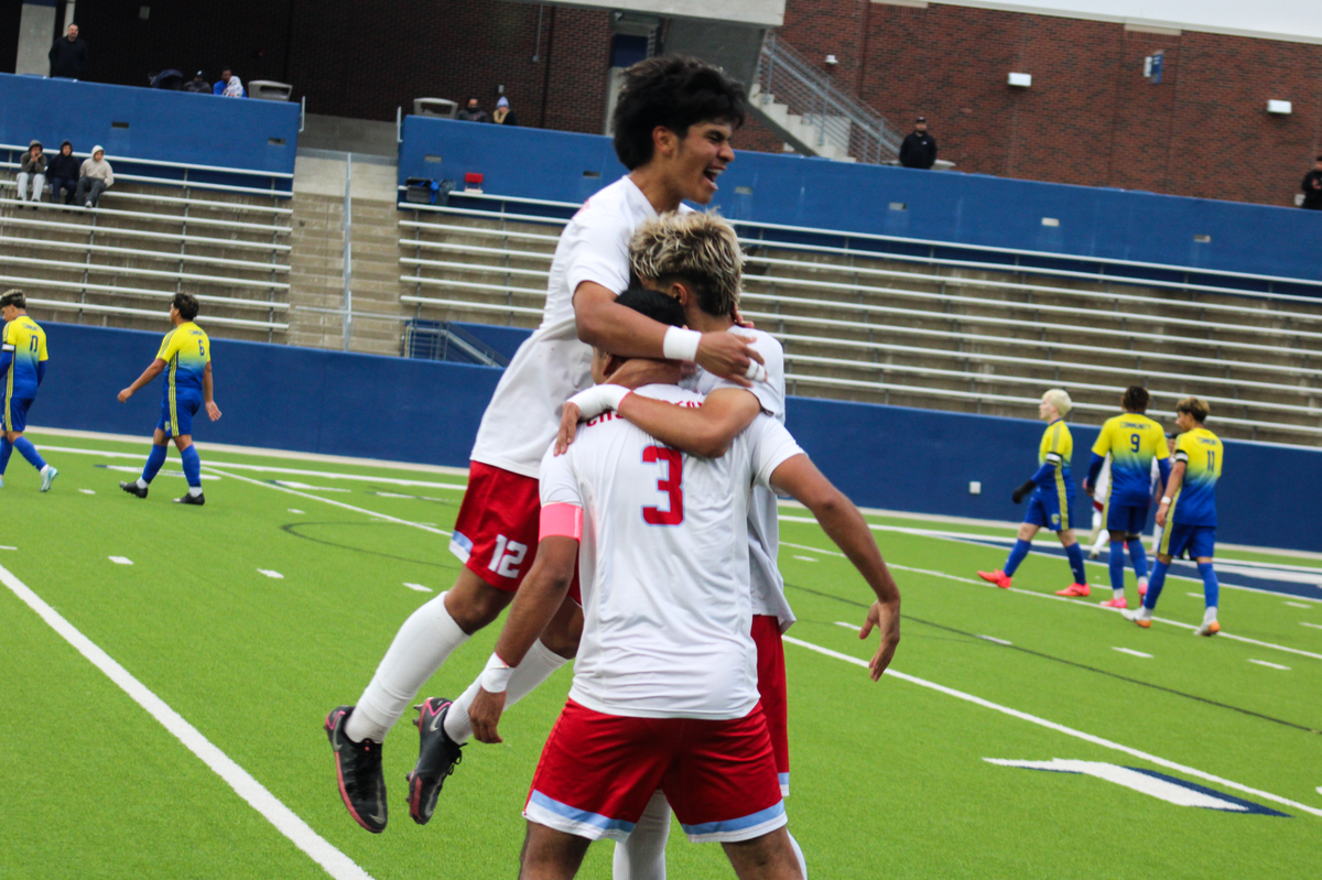 River Oaks Castleberry’s Gerardo Garcia (3) and Jose Chairez (12), leaping, celebrate with another teammate after defeating Nevada Community in a Class 4A Division 1 state semifinal on Saturday, April 5, 2025 at McKinney ISD Stadium in McKinney, Texas. Castleberry defeated Community 2-0.