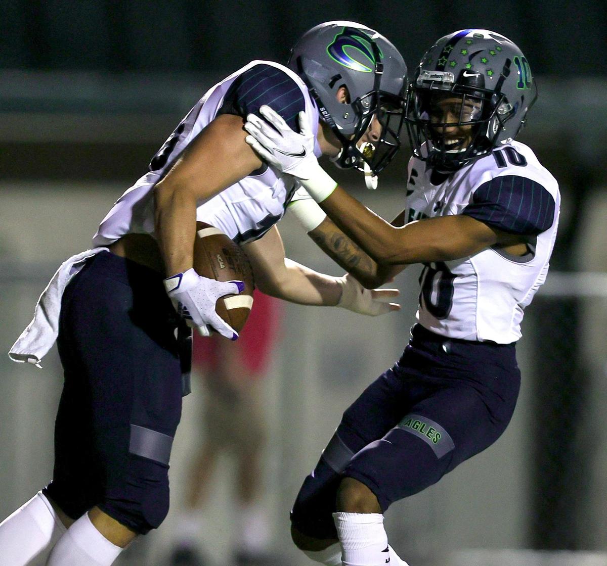 Eaton receiver Kenneth Greene (L) celebrates with Max Sio-Johnson (10) after Greene’s touchdown reception against Keller Fossil Ridge during the first half of a high school football, October 22, 2020 played a Keller ISD Stadium in Keller, Tx. (Steve Nurenberg Special to the Star-Telegram)