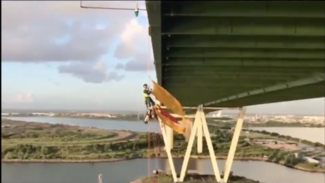 22 Greenpeace activists face federal charges in Texas bridge protest, officials say