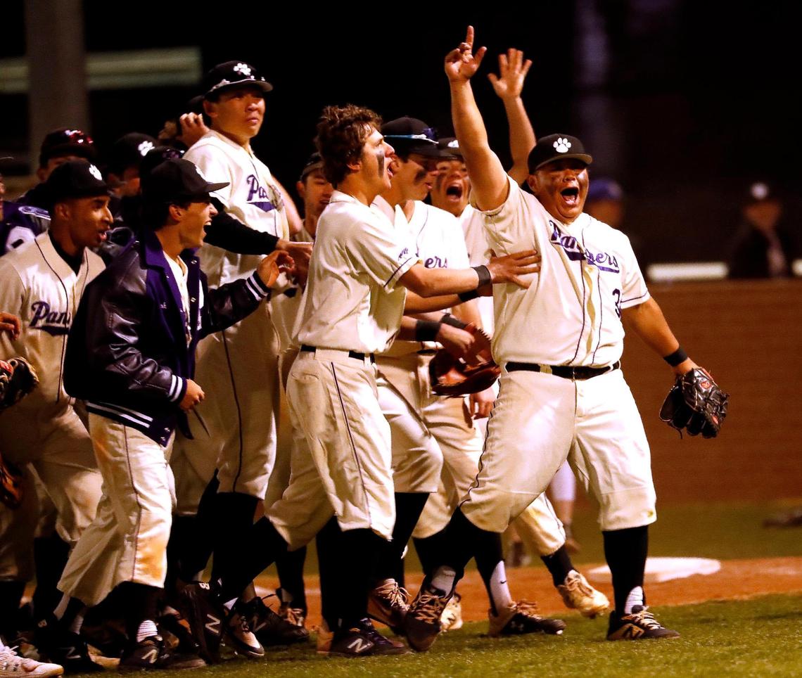 Paschal pitcher Nico Vasquez (34) celebrates with teammates after closing out a win over Arlington Heights during the Drew Medford Memorial Tournament on March 12, 2022, at Paschal.