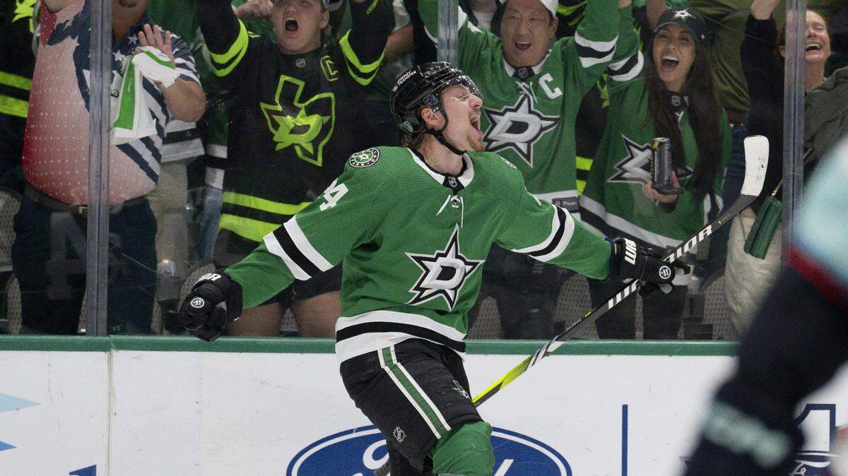 Dallas Stars Roope Hintz (24) celebrates after he scores on a breakaway against Seattle Kraken in the second period of the Stars win in Game 7 of their second round playoff series. The Stars advanced to the Western Conference finals.