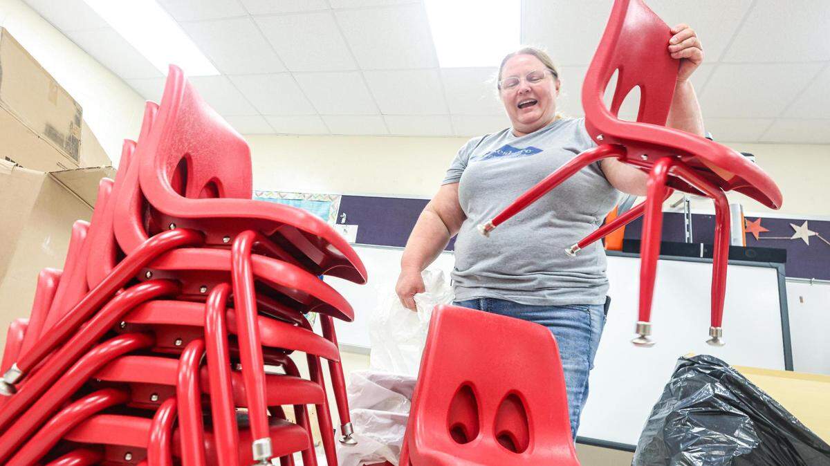 Tami Reis of Lakeshore Learning Materials unpacks classroom chairs for a pre-kindergarten classroom at M.H. Moore Elementary School in Fort Worth on Friday, July 28, 2023.