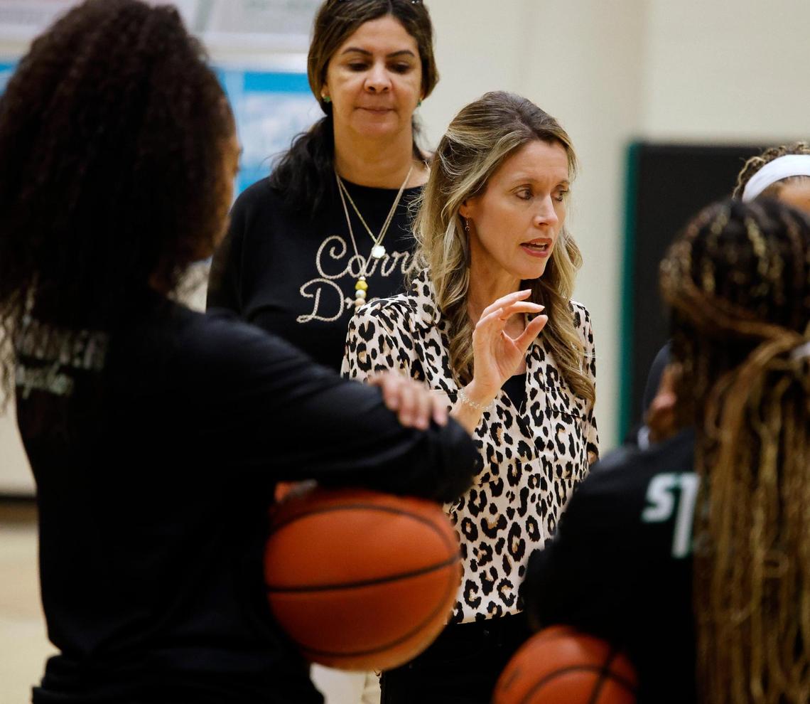 Dragon head coach Robyn McCoart talks to the team after a shoot around at Southlake Sr. High School in Southlake, Texas, Tuesday, Feb. 06, 2024.