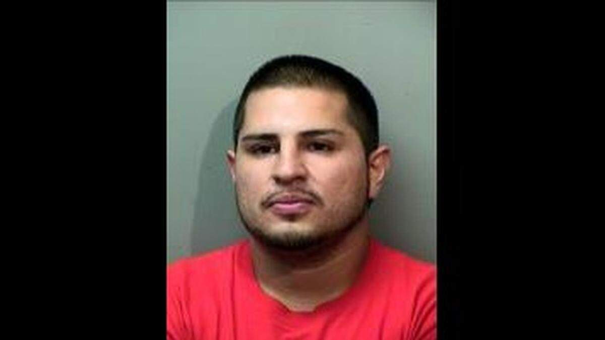 Edgar Reza was charged with assault after police say he ran over his ex-girlfriend’s boyfriend with his truck in December 2018.