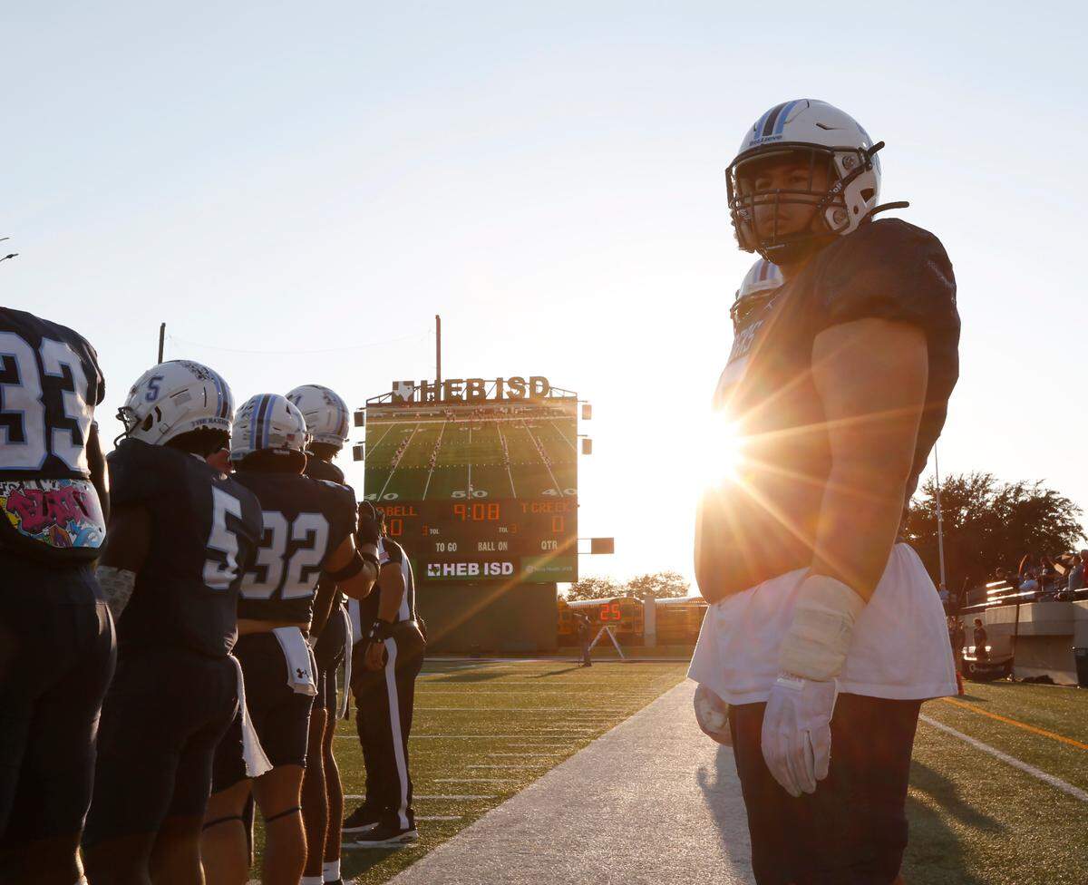 L.D. Bell’s Jayden Ayala waits on the side line for the coin toss before Bell’s game UIL football game Friday night at Pennington Field in Hurst on Friday Sept. 6, 2024.