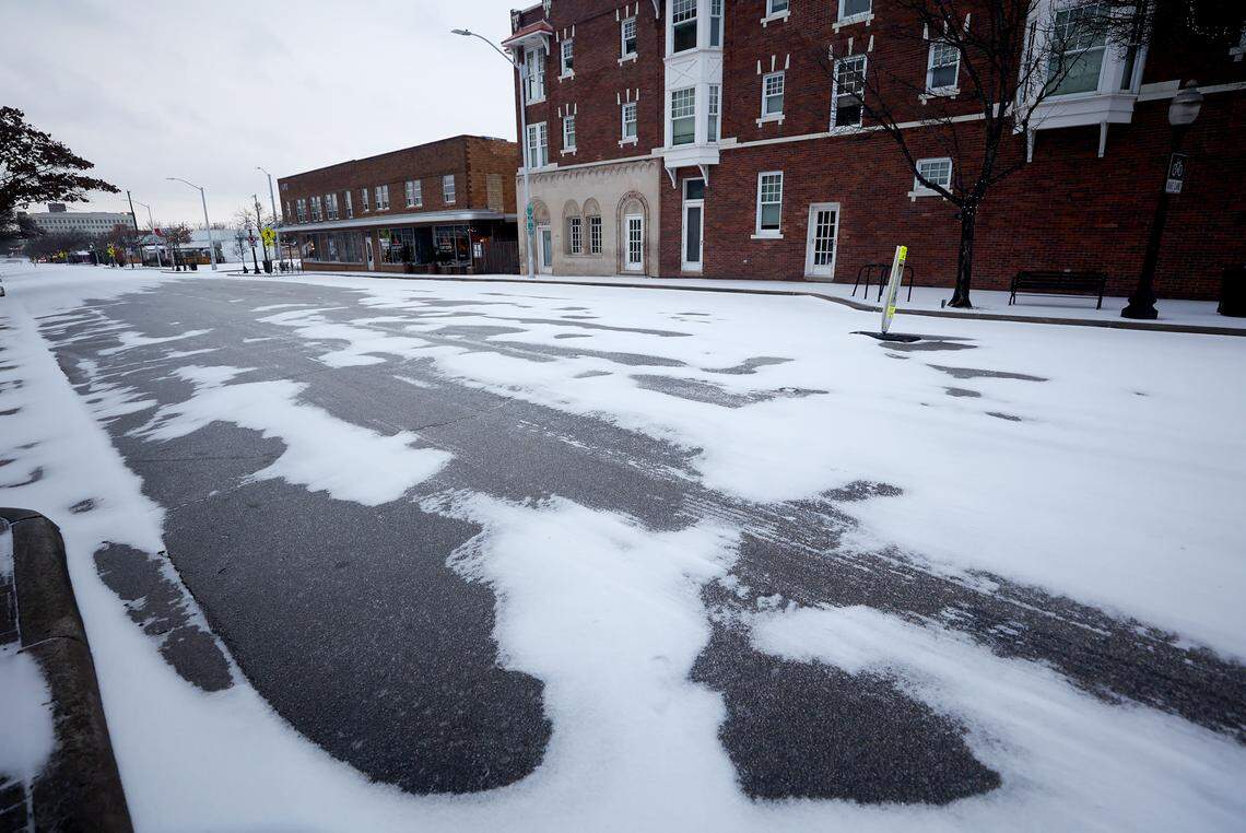 Patches of black ice on Magnolia Avenue in Fort Worth on Thursday, February 3, 2022.