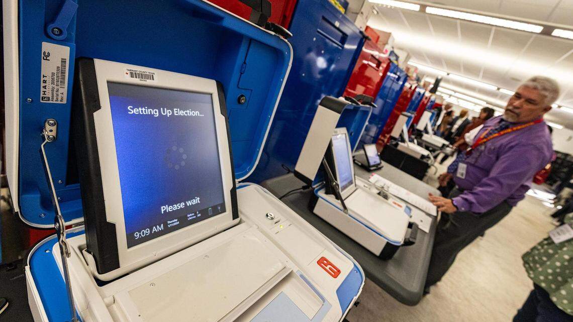 Volunteers participate in a public mock election to test the integrity of the voting equipment at the Tarrant County Election Administration building in Fort Worth in January.