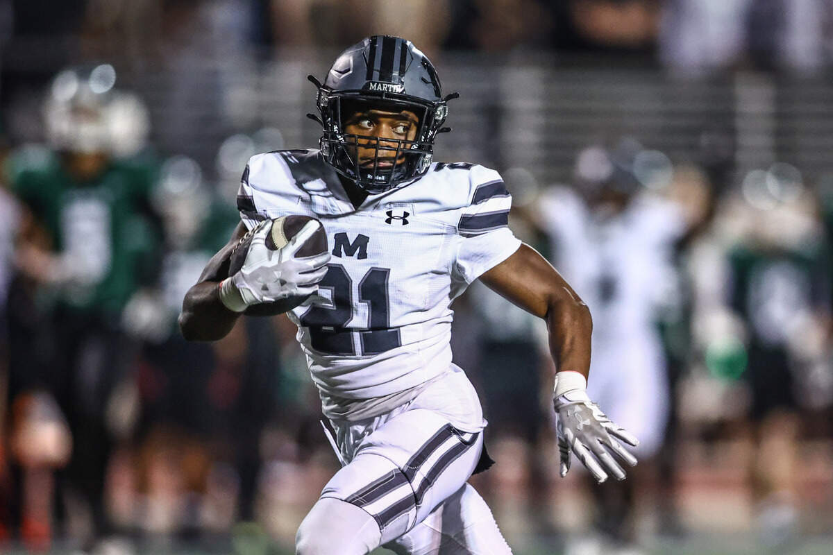 Arlington Martin running back Christian Moore runs for a touchdown against Arlington during the Thursday, Nov. 7 game at UTA’s Maverick Stadium in Arlington. Special to the Star-Telegram / Tom Marvin