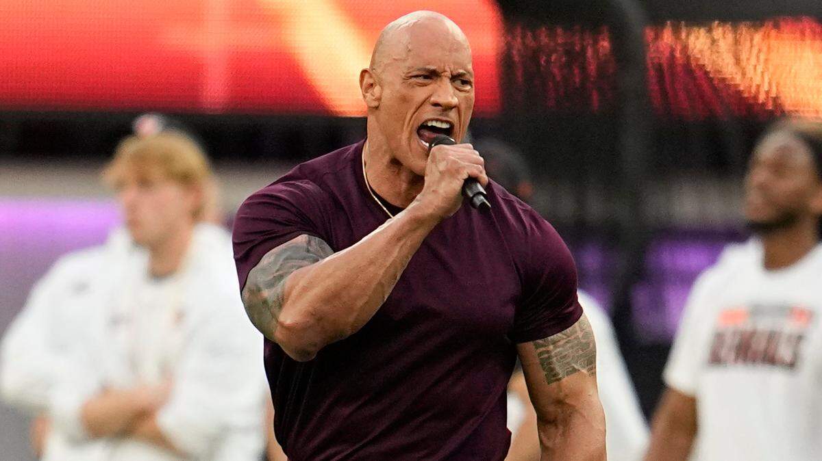 Dwayne “The Rock” Johnson addresses the crowd before Super Bowl 56 at SoFi Stadium in Inglewood, Calif.