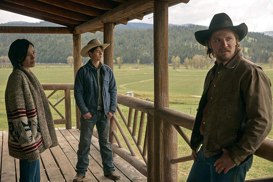 L-R: Kelsey Asbille as Monica Long, Brecken Merrill as Tate Dutton, Luke Grimes as Kacey Dutton on episode 509 of Paramount Network’s “Yellowstone”. 