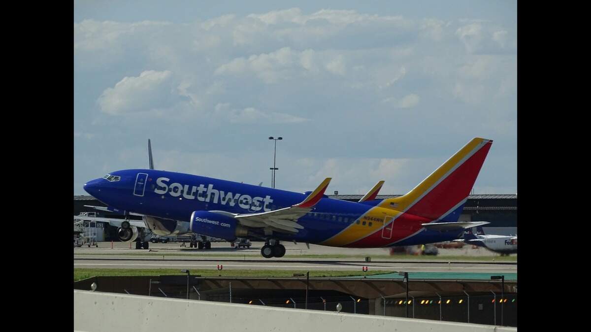 A Southwest Airlines flight (not the one pictured) made an emergency landing in Denver, Colorado, when a piece of the Boeing airplane came off during takeoff to its destination in Houston, Texas, officials say.