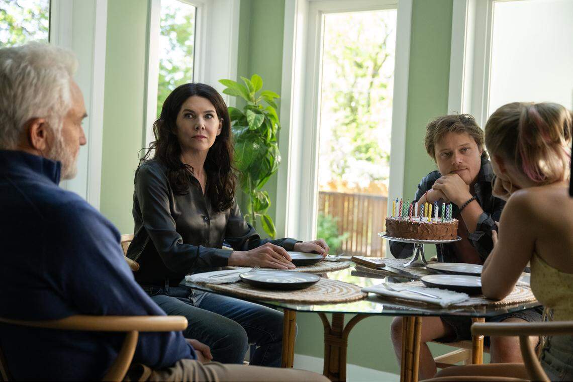 (From left) Patrick Landry (Bradley Whitford), Grace Landry (Lauren Graham), Scotty Landry (Rudy Pankow) and Kenna Rowan (Maika Monroe) in “Reminders of Him,” directed by Vanessa Caswill.